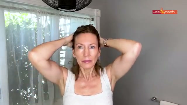 @angiehotandflashy reviewing Bed Head Queen for a Day Thickening Spray at 11:59 in a YouTube Shorts video