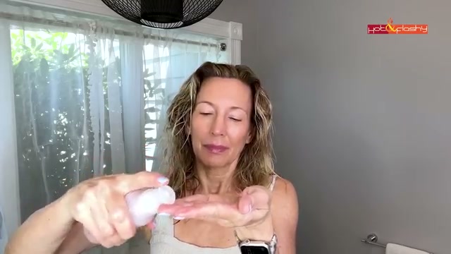 @angiehotandflashy reviewing Colleen Rothschild Smooth & Shine Hair Serum at 10:34 in a YouTube Shorts video