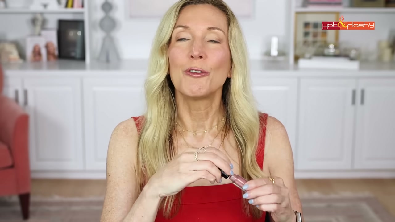 @angiehotandflashy reviewing DRMTLGY Lip Silk SPF 40 at 11:34 in a YouTube Shorts video
