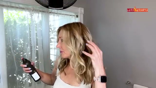 @angiehotandflashy reviewing Kristen Ess Ultra Fine Workable Hairspray at 16:50 in a YouTube Shorts video