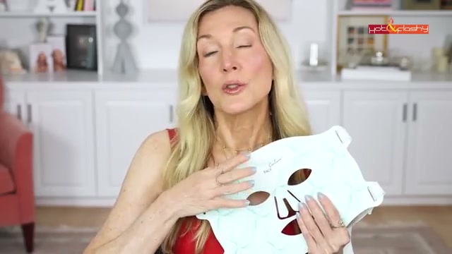 @angiehotandflashy reviewing Omnilux Contour Red Light Mask at 19:12 in a YouTube Shorts video