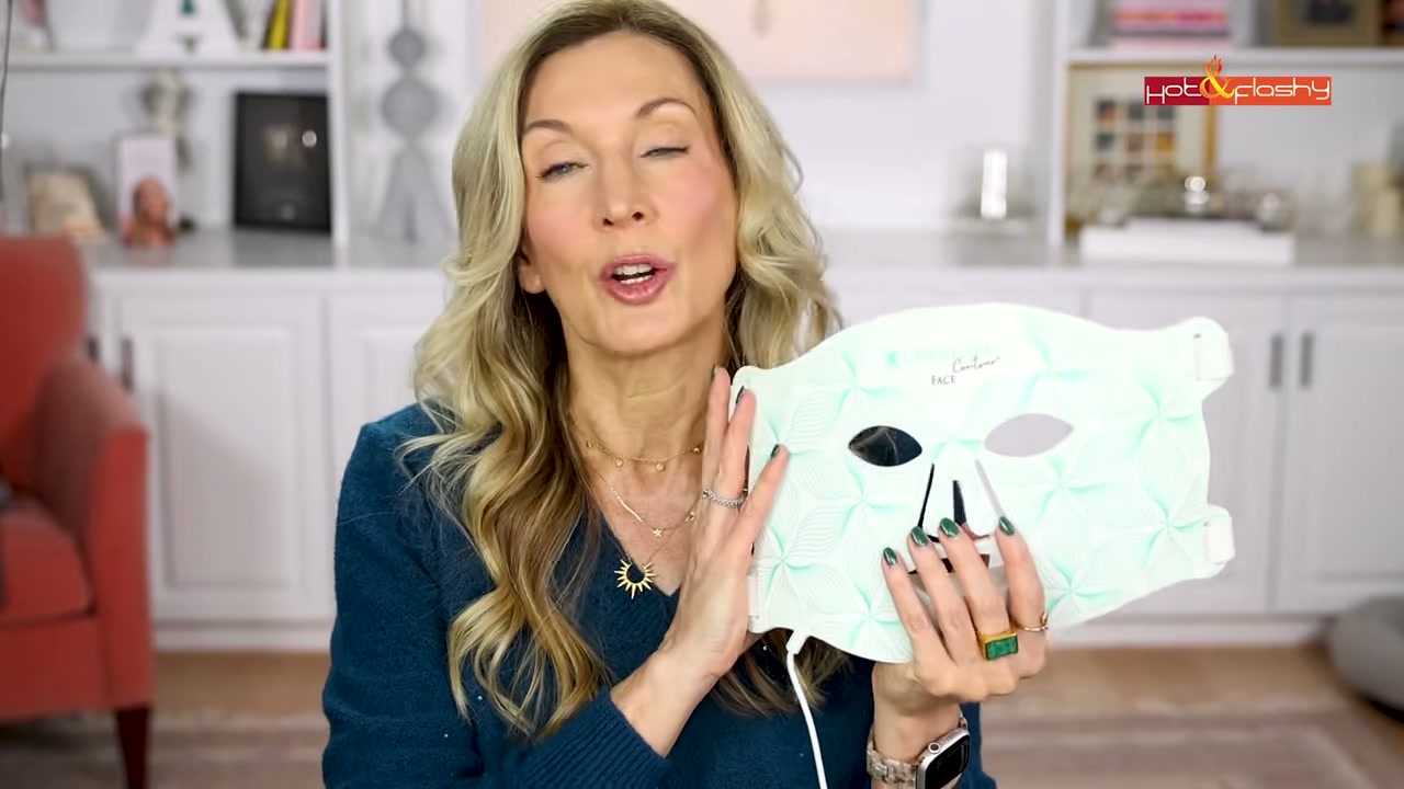 @angiehotandflashy reviewing Omnilux Red Light LED Mask at 14:32 in a YouTube Shorts video