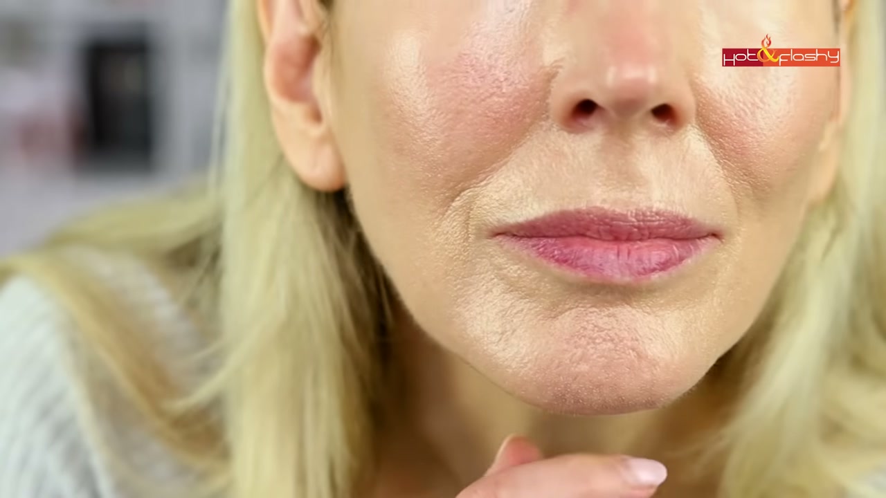 @angiehotandflashy reviewing Sarah Creal Brilliant Repair Shield Illuminating SPF 50 at 10:49 in a YouTube Shorts video