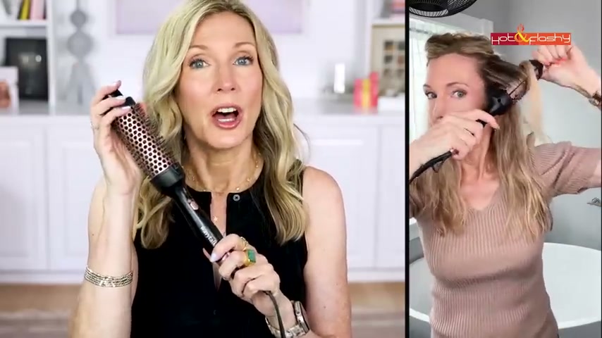 @angiehotandflashy reviewing Wavytalk Hot Curling Brush at 13:54 in a YouTube Shorts video