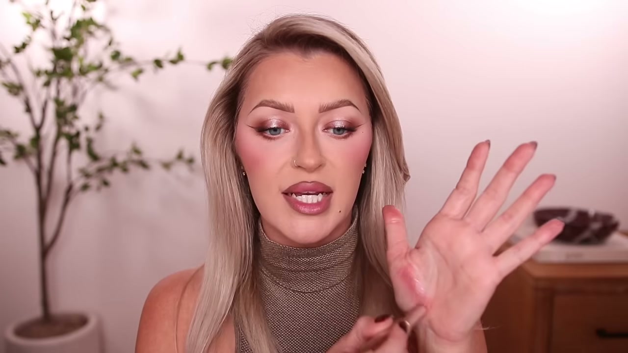 @babsbeauty reviewing Armani Beauty Prisma Glossy Lip Balm at 28:50 in a YouTube Shorts video