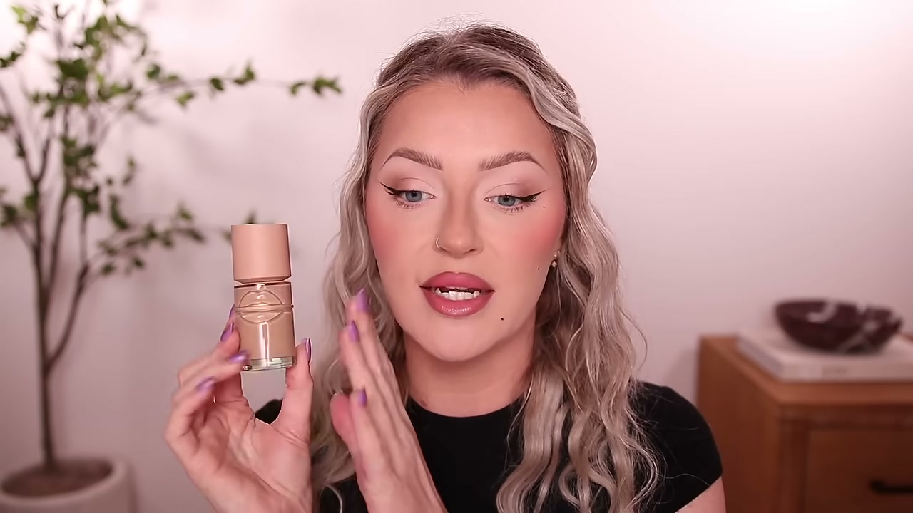 @babsbeauty reviewing MAKE UP FOR EVER Natural Finish Foundation at 03:05 in a YouTube Shorts video