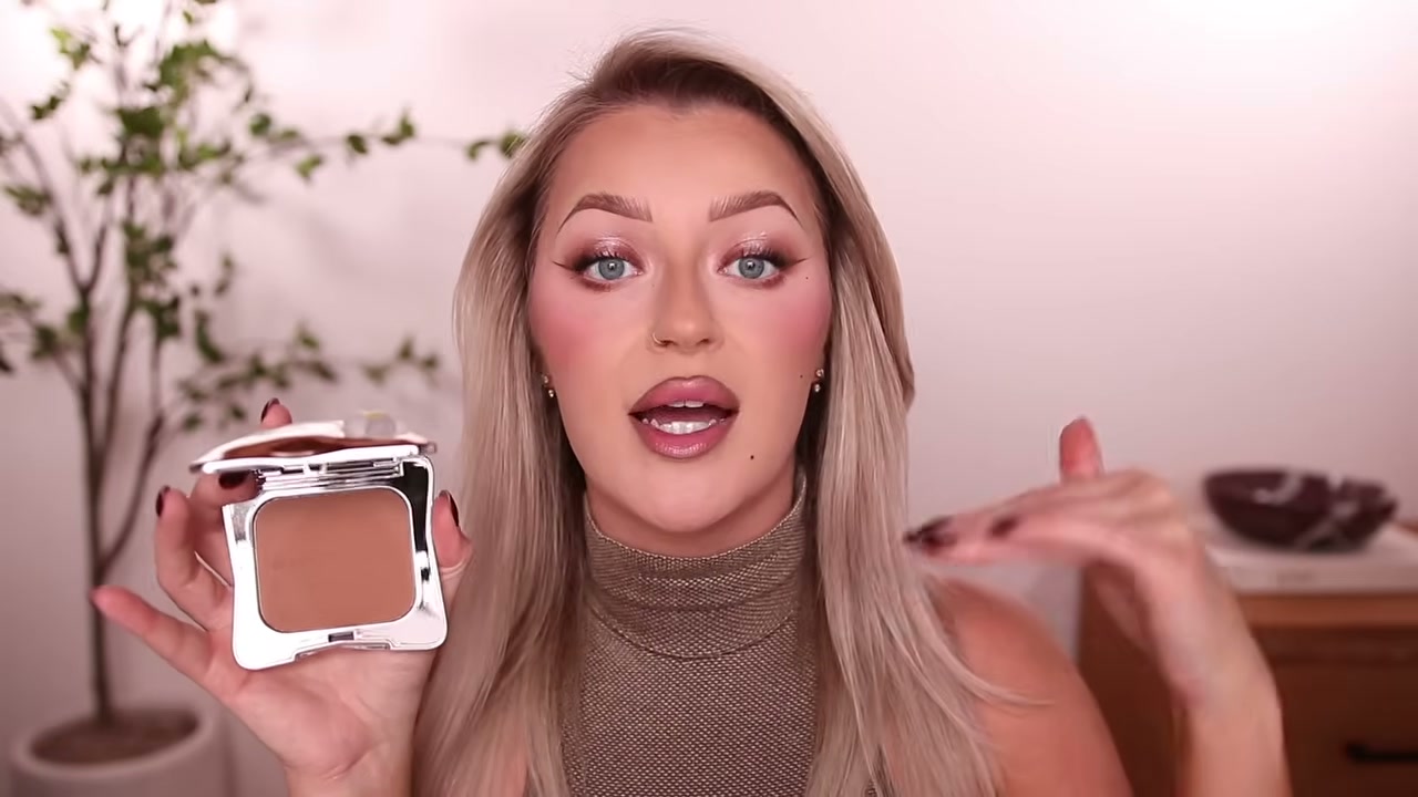 @babsbeauty reviewing Marc Jacobs Legally Bronze Bronzer at 13:49 in a YouTube Shorts video