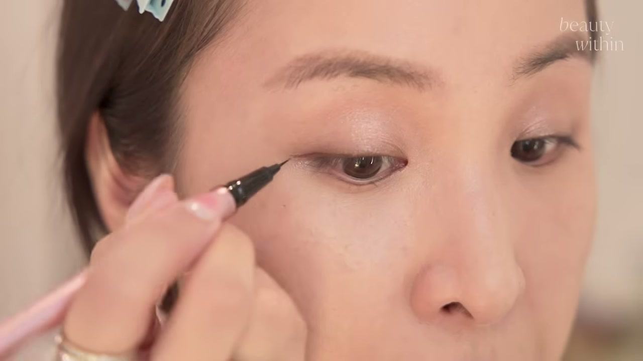 @beautywithin reviewing ILM Ultra Thin Liquid Eyeliner at 12:37 in a YouTube Shorts video