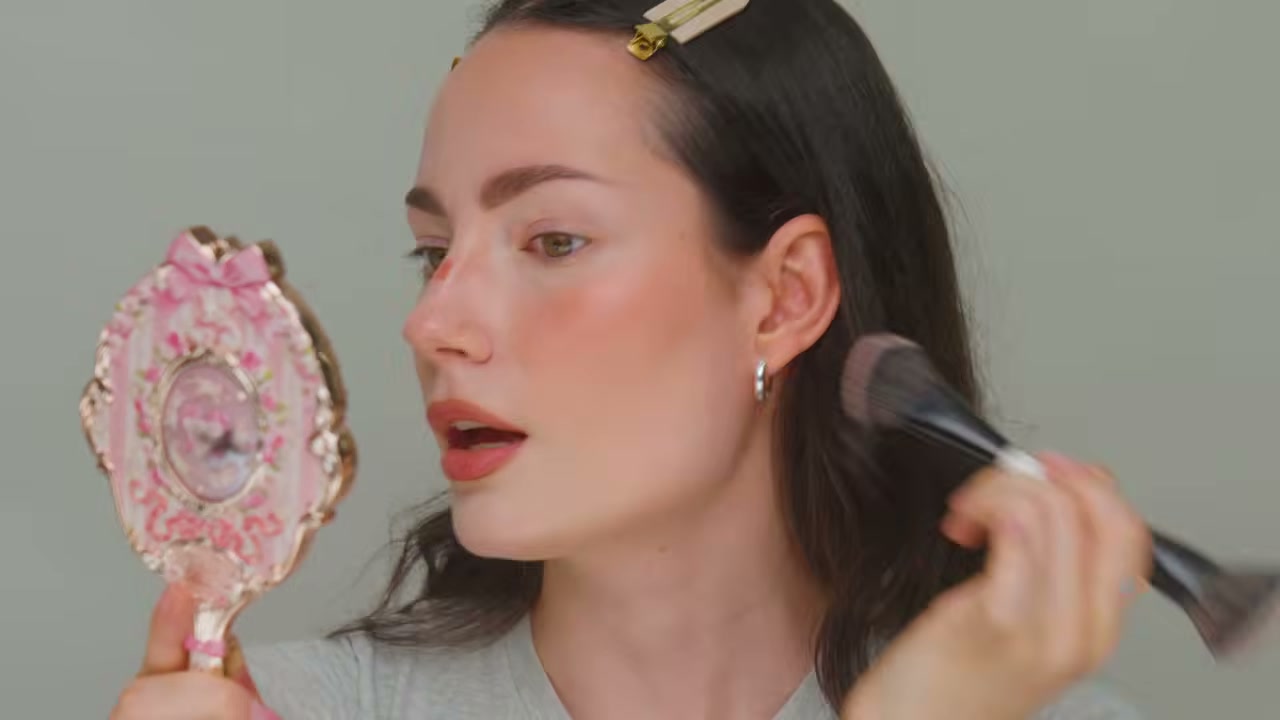 @benkobeauty reviewing NARS Insatiable Liquid Blush at 07:10 in a YouTube Shorts video