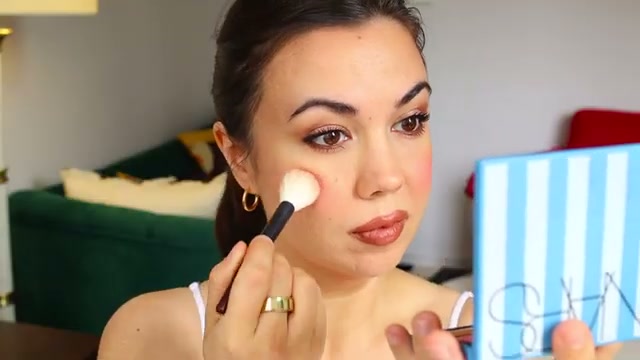 @bornblushing reviewing NARS Hot Escape Cheek and Face Palette at 14:09 in a YouTube Shorts video