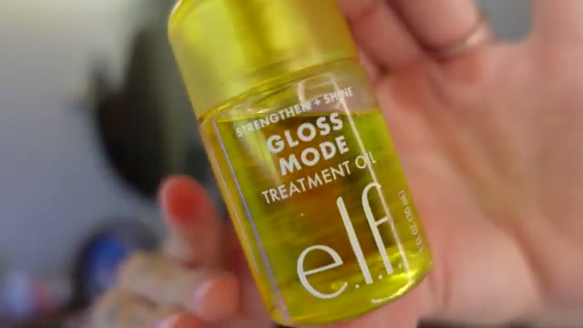 @brittneealexus reviewing e.l.f. Cosmetics Gloss Mode at 15:16 in a YouTube Shorts video