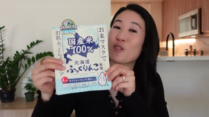 @buildyourmoxie reviewing Fukurinku Rice Essence Face Mask at 03:17 in a YouTube Shorts video