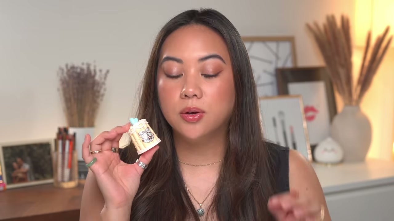@bykristinastudio reviewing Flower Knows Sweetie Bear Collection Coating Lip Jelly at 06:02 in a YouTube Shorts video