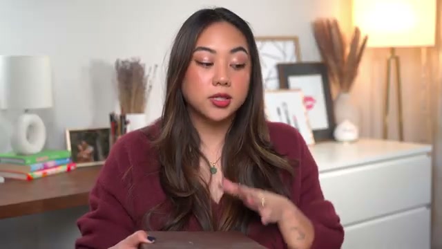 @bykristinastudio reviewing Laundry Sauce Detergent Pods at 01:56 in a YouTube Shorts video
