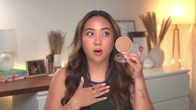 @bykristinastudio reviewing Milani Silky Matte Bronzing Powder at 19:23 in a YouTube Shorts video