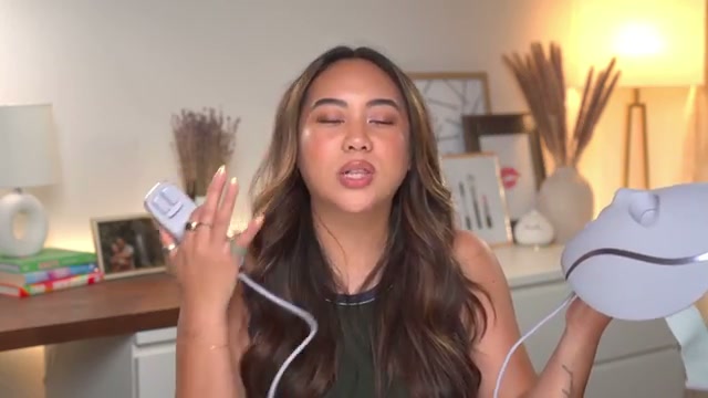 @bykristinastudio reviewing Shark CryoGlow LED Face Mask at 33:36 in a YouTube Shorts video