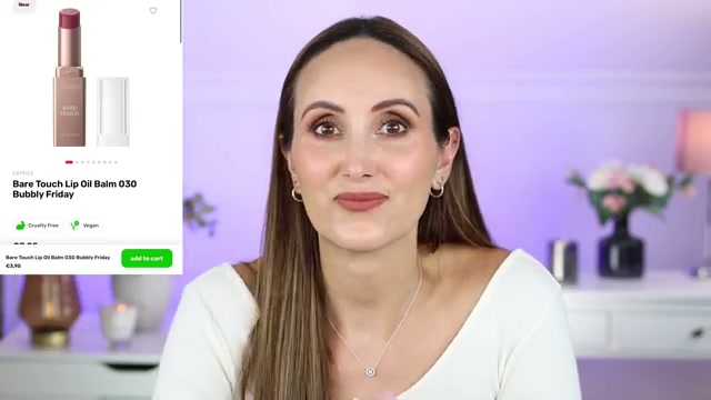@carmelnicolebeauty reviewing Catrice Bare Touch Lip Oil Balm at 05:48 in a YouTube Shorts video