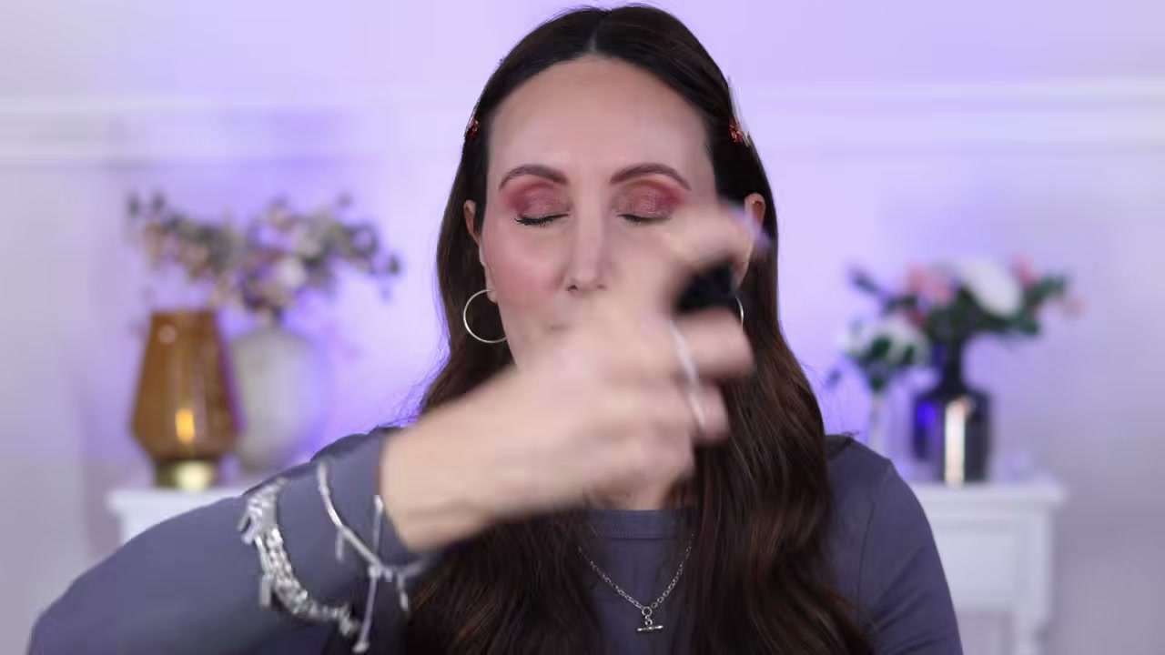 @carmelnicolebeauty reviewing Catrice Blend + Bond Setting Spray at 30:52 in a YouTube Shorts video