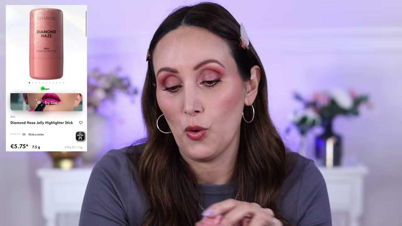 @carmelnicolebeauty reviewing Catrice Diamond Haze Jelly Highlighter Stick at 29:00 in a YouTube Shorts video