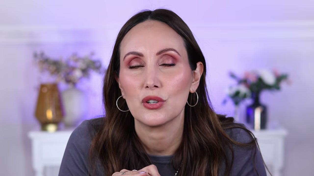 @carmelnicolebeauty reviewing Catrice Glass Like Gloss Stick at 32:37 in a YouTube Shorts video
