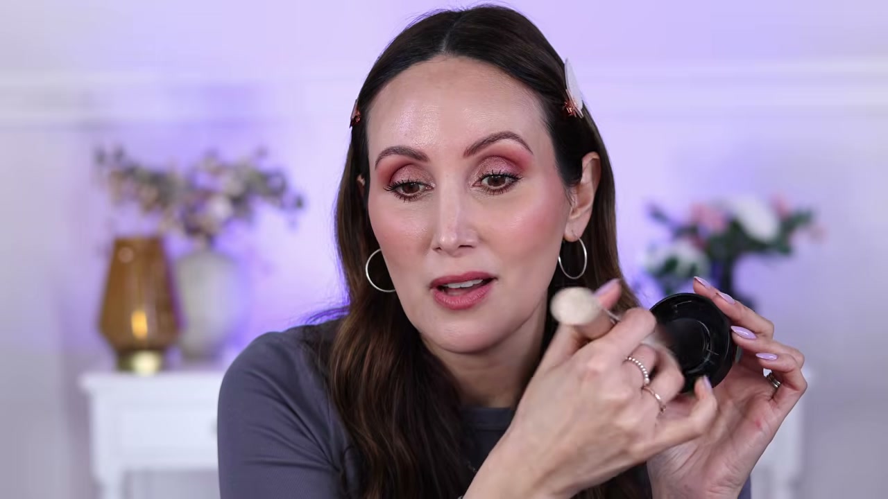 @carmelnicolebeauty reviewing Catrice Soft Blur Matte Setting Powder at 28:30 in a YouTube Shorts video