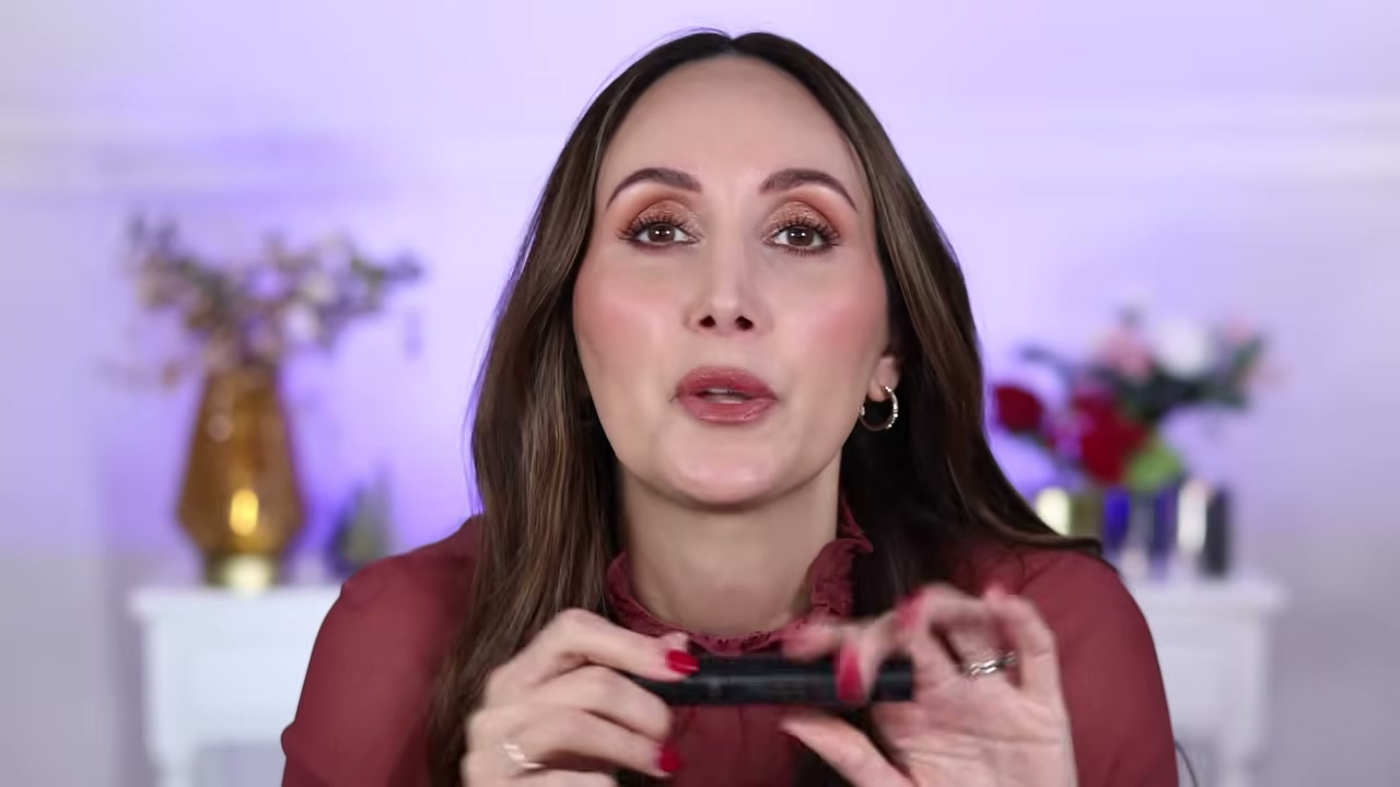 @carmelnicolebeauty reviewing Catrice Stay in Place Mascara at 33:24 in a YouTube Shorts video
