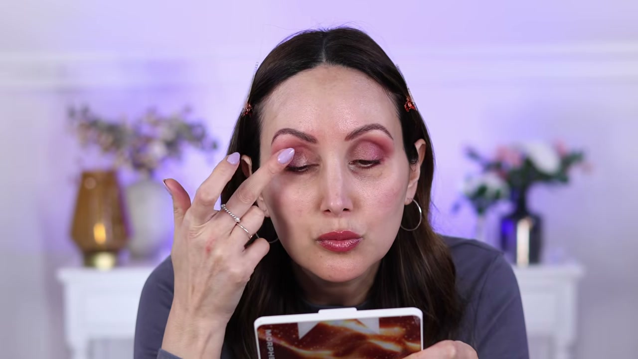 @carmelnicolebeauty reviewing Catrice The Deep Velvet Eyeshadow Palette at 09:10 in a YouTube Shorts video