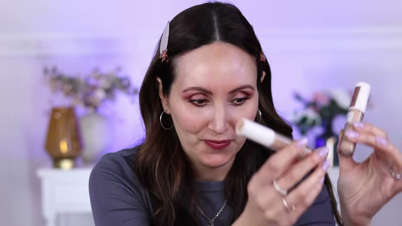 @carmelnicolebeauty reviewing Catrice True Skin High Coverage Concealer at 13:57 in a YouTube Shorts video