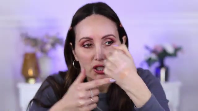 @carmelnicolebeauty reviewing Catrice Under Eye Brightener at 12:19 in a YouTube Shorts video