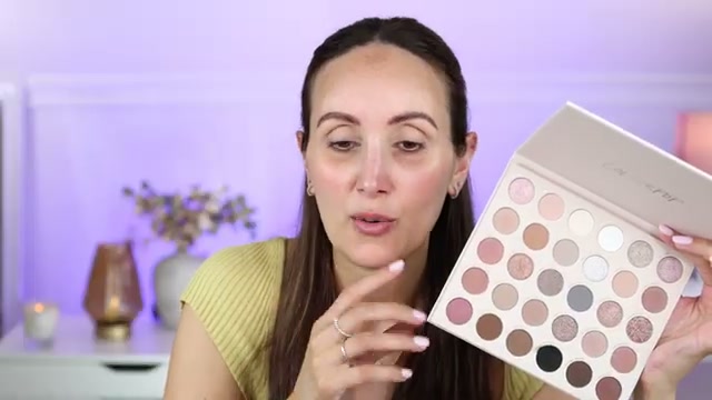 @carmelnicolebeauty reviewing ColourPop Stone Cold Fox Eyeshadow Palette at 06:23 in a YouTube Shorts video