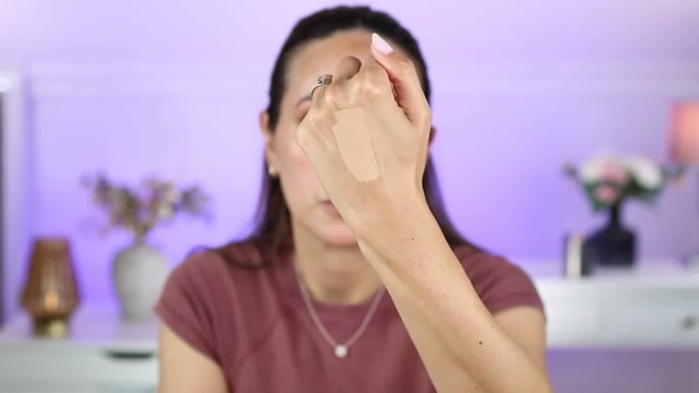 @carmelnicolebeauty reviewing ILIA Skin Blur Serum Concealer at 14:02 in a YouTube Shorts video