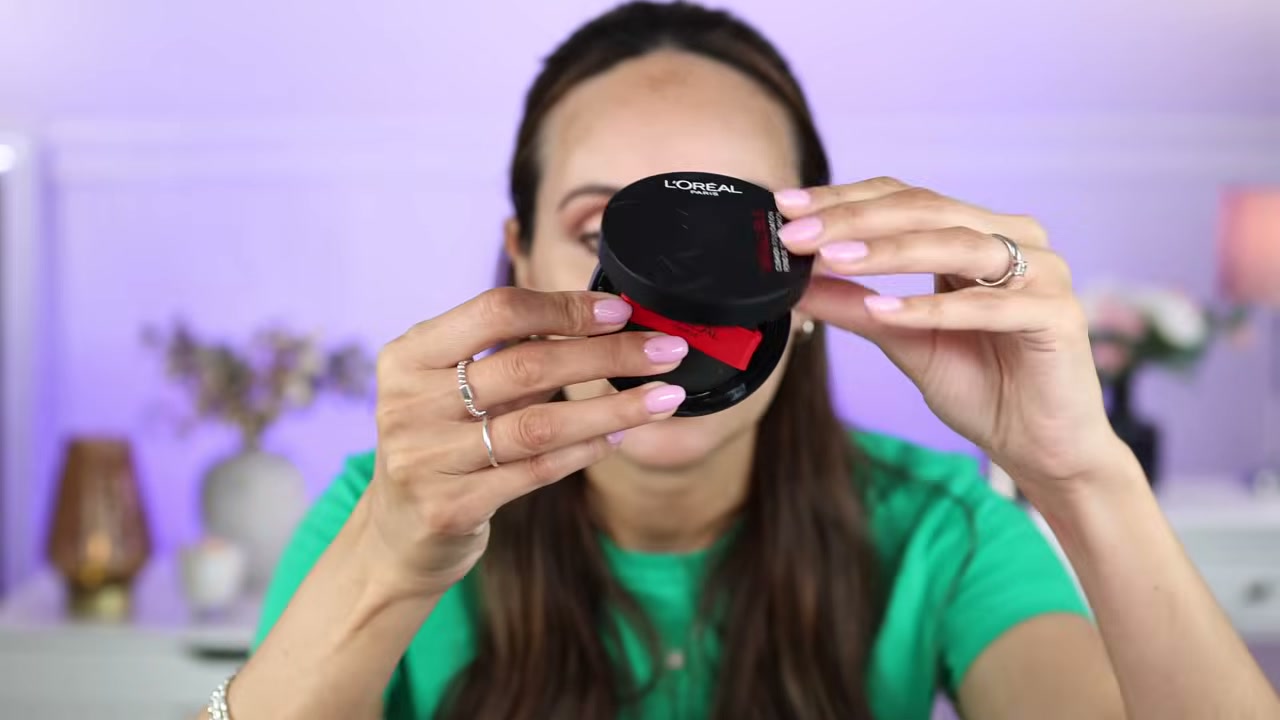 @carmelnicolebeauty reviewing L'Oreal Paris Infallible Fresh Wear Cushion Foundation at 12:08 in a YouTube Shorts video