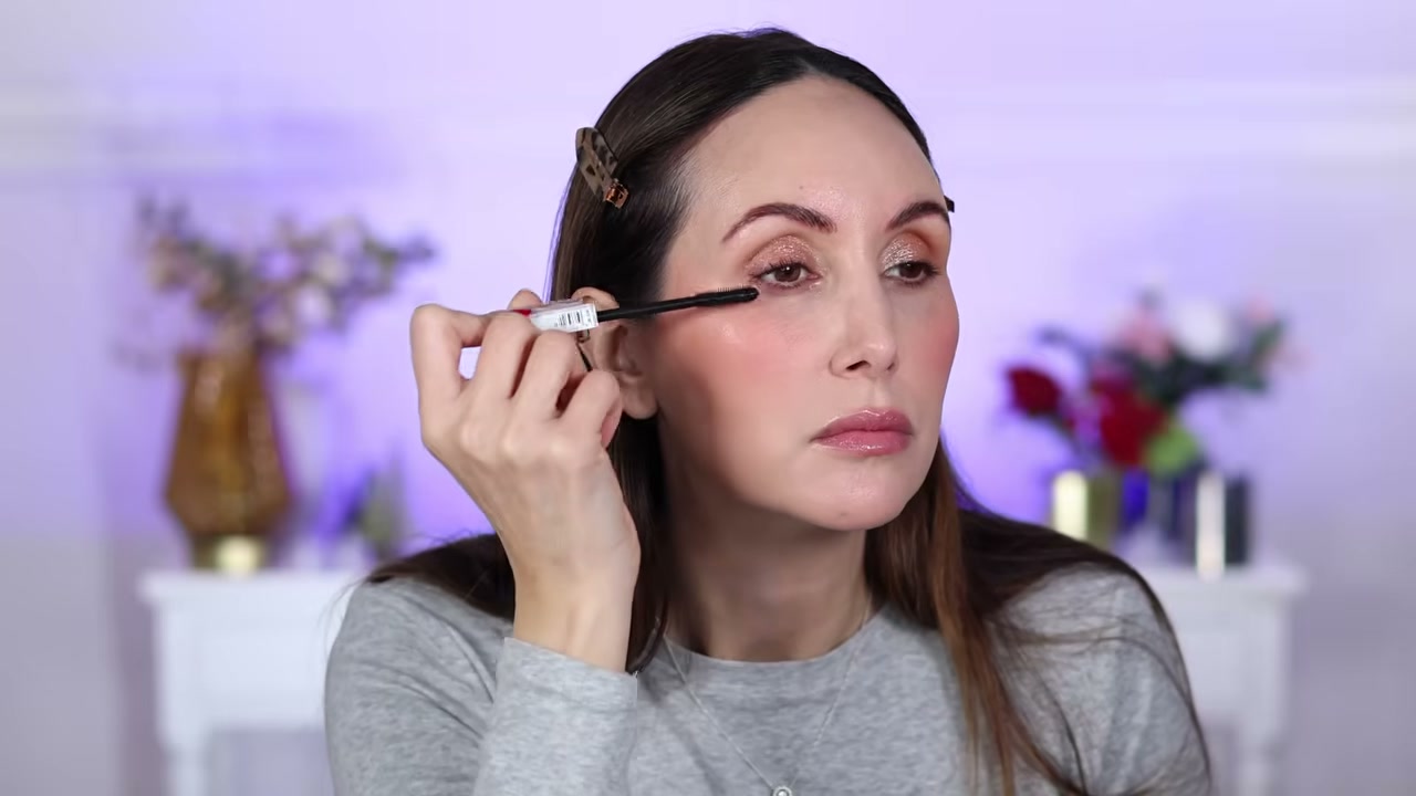@carmelnicolebeauty reviewing Maybelline Lash Sensational Body Mascara at 32:03 in a YouTube Shorts video
