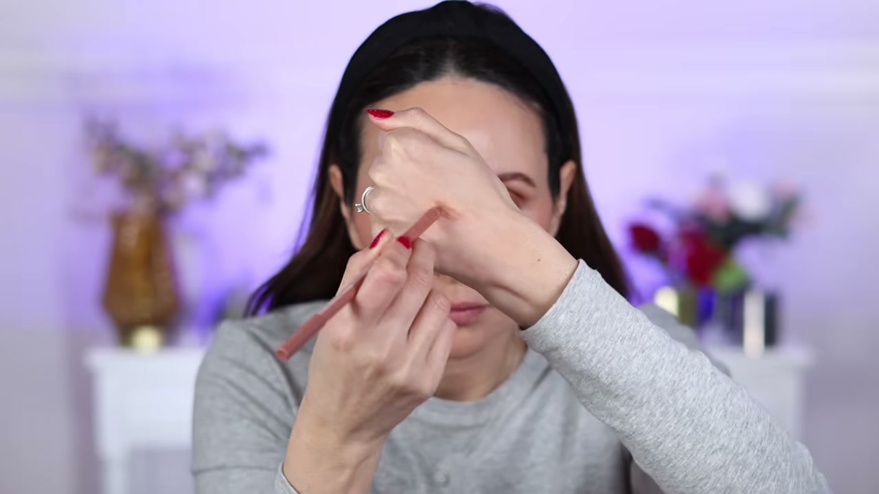 @carmelnicolebeauty reviewing Morphe Signature Lip Pencil at 35:08 in a YouTube Shorts video