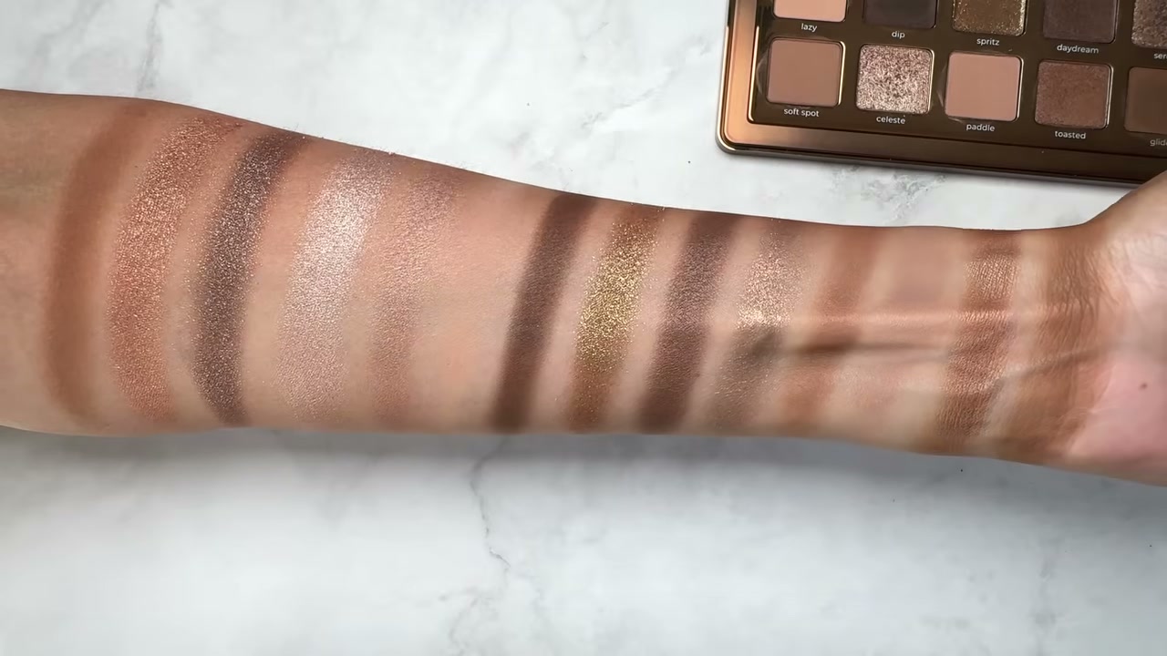 @carmelnicolebeauty reviewing Natasha Denona Tan Eyeshadow Palette at 06:56 in a YouTube Shorts video
