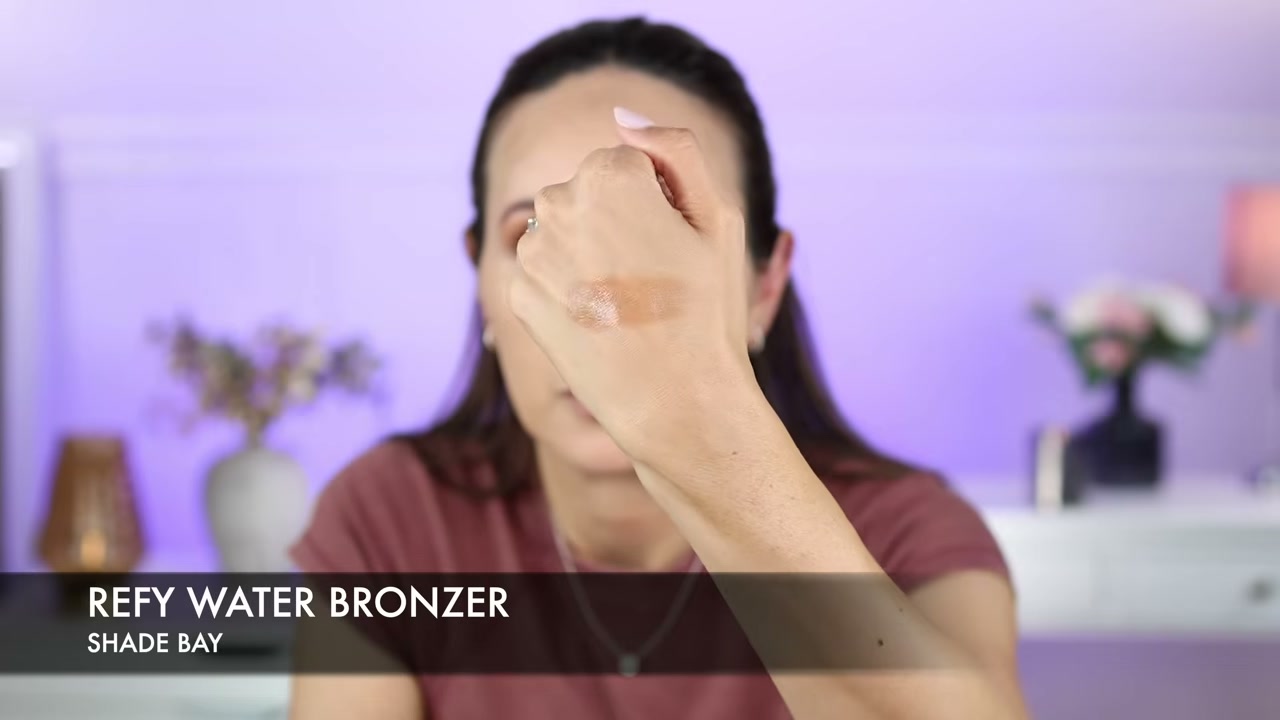 @carmelnicolebeauty reviewing REFY Water Bronzer at 12:28 in a YouTube Shorts video