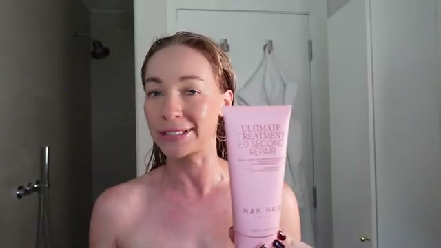 @chloeswiftstylist reviewing Nak Ultimate Treatment - 60 Second Repair at 15:15 in a YouTube Shorts video