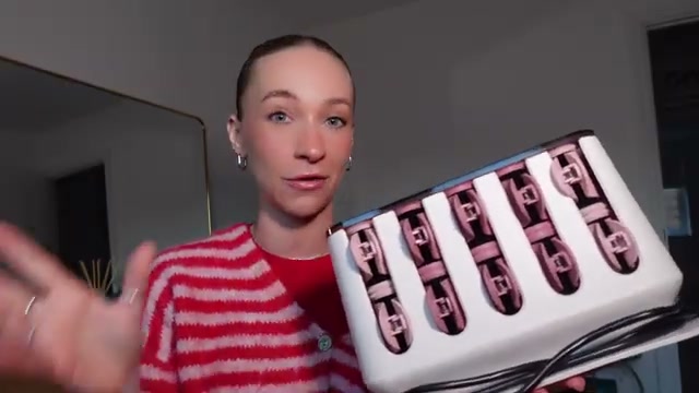 @chloeswiftstylist reviewing Remington Pro-Luxe Heated Hair Rollers at 12:33 in a YouTube Shorts video