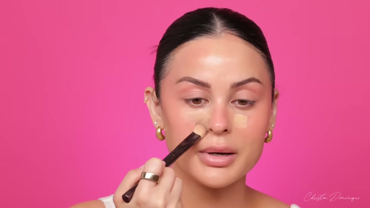 @christendominique reviewing Dominique Cosmetics Concealer at 08:05 in a YouTube Shorts video