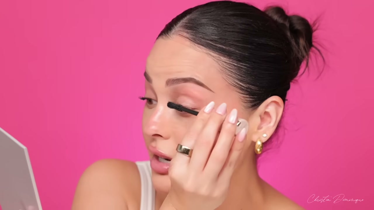 @christendominique reviewing Dominique Cosmetics Lash Lift XL Tubing Mascara at 10:29 in a YouTube Shorts video
