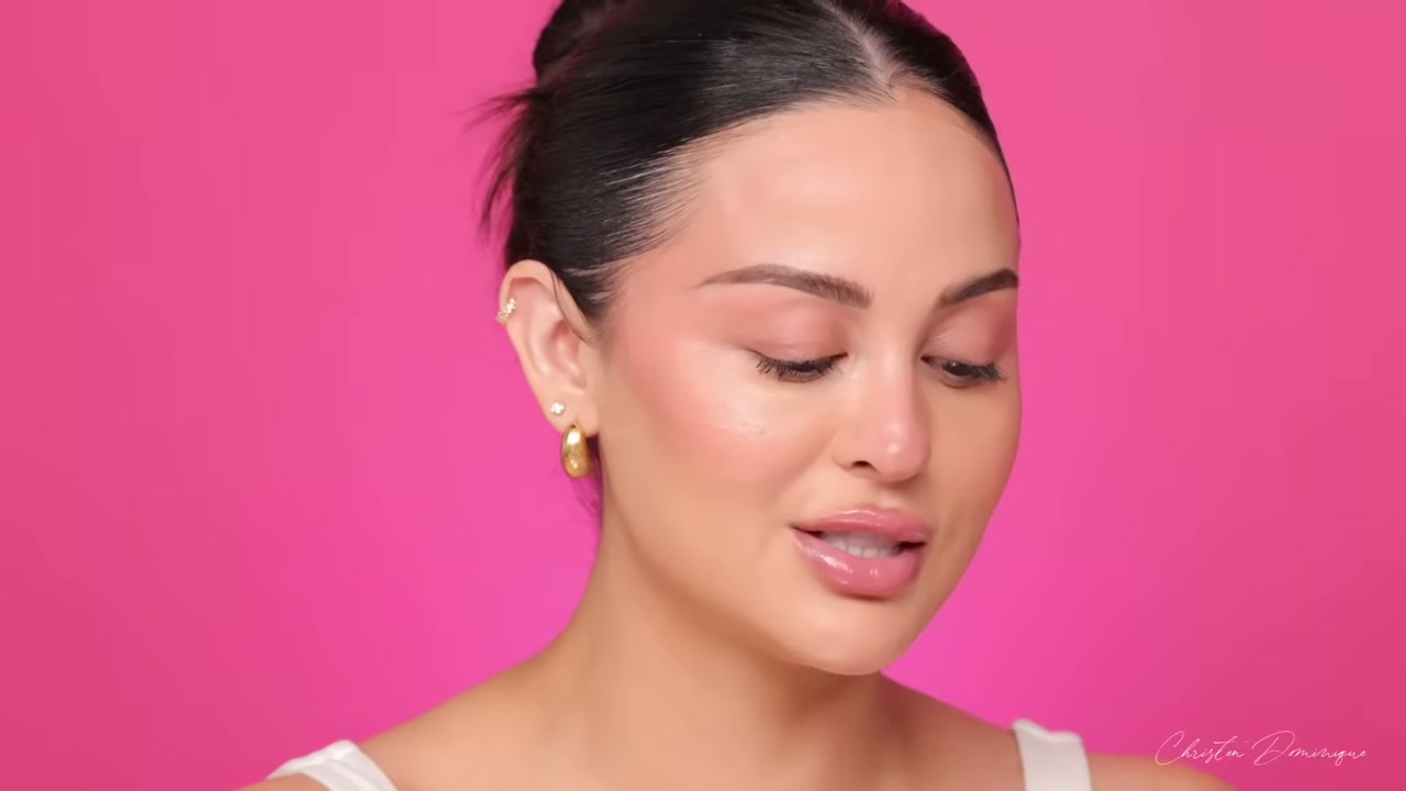 @christendominique reviewing Dominique Cosmetics Smooth & Blur Setting Powder at 11:24 in a YouTube Shorts video