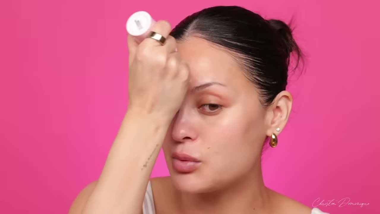 @christendominique reviewing Glow Recipe Watermelon Glow Niacinamide Sunscreen SPF 50 at 01:12 in a YouTube Shorts video