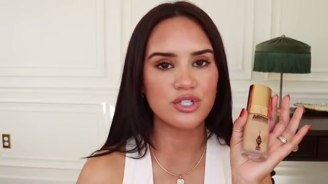 @daceycash reviewing Charlotte Tilbury Airbrush Flawless Foundation at 40:51 in a YouTube Shorts video
