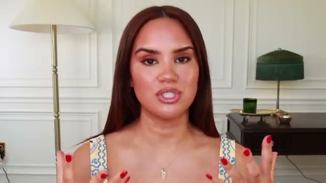 @daceycash reviewing Kérastase Elixir Ultime L'Huile Originale Hair Oil at 40:00 in a YouTube Shorts video