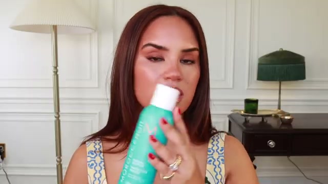 @daceycash reviewing Moroccanoil Perfect Defense Heat Protectant at 35:41 in a YouTube Shorts video