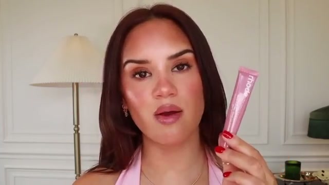 @daceycash reviewing Rhode Tinted Peptide Lip Treatment at 44:02 in a YouTube Shorts video