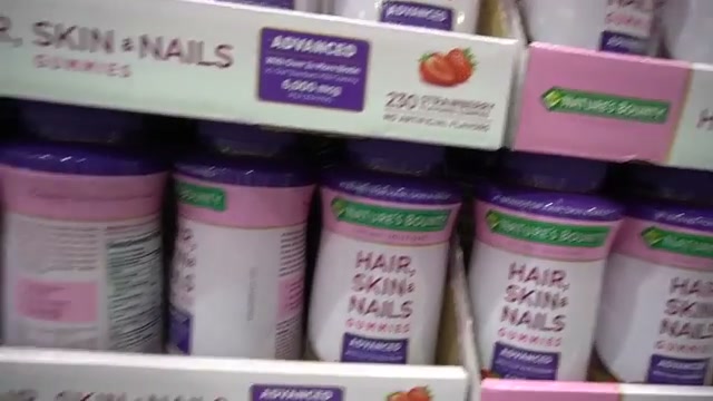 @drdrayzday reviewing Nature's Bounty Hair, Skin, and Nails Advanced Gummies at 00:16 in a YouTube Shorts video