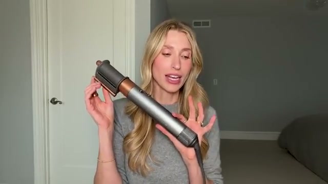 @drsamellis reviewing Dyson Airwrap Multi-Styler at 12:09 in a YouTube Shorts video