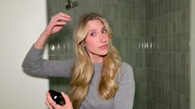 @drsamellis reviewing Oribe Dry Texturizing Spray at 21:48 in a YouTube Shorts video