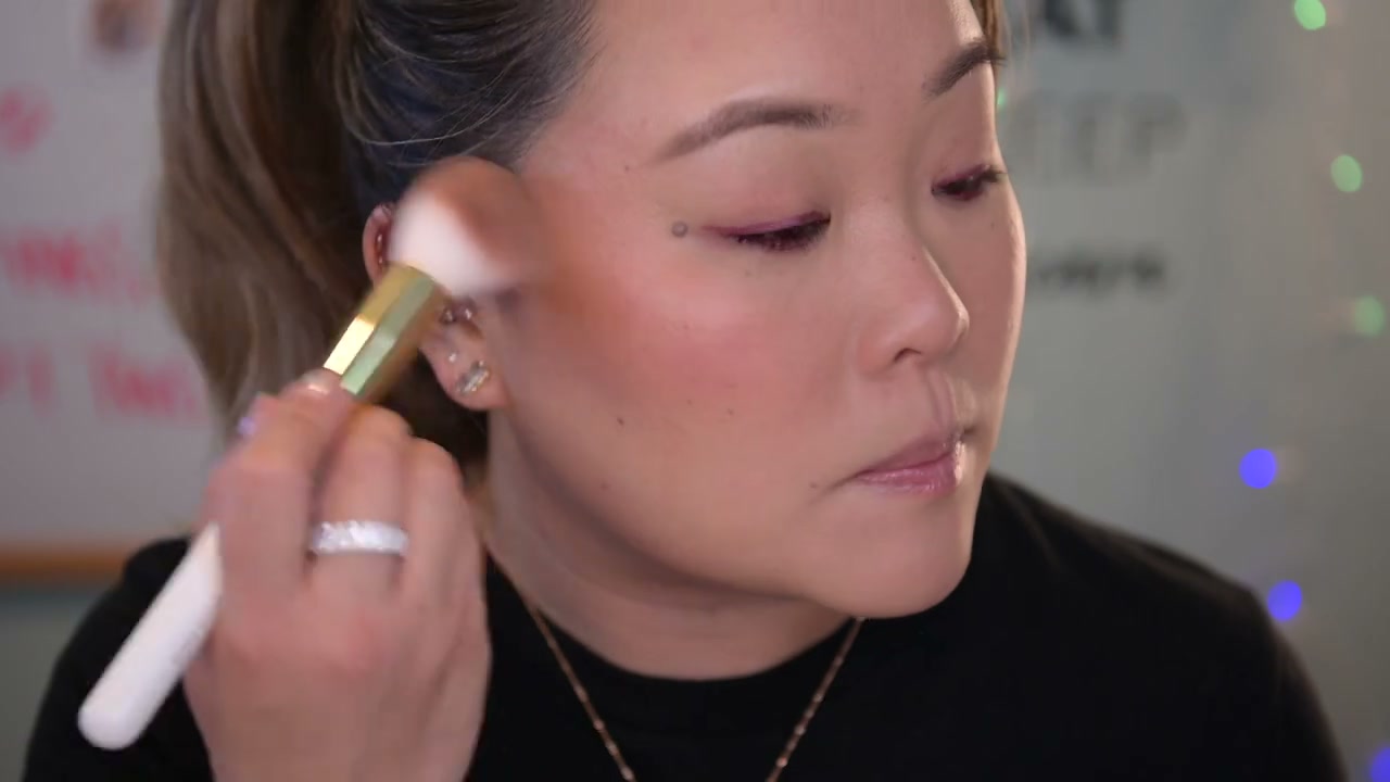 @eatsleepmascara reviewing Milani Baked Bronzer at 06:01 in a YouTube Shorts video